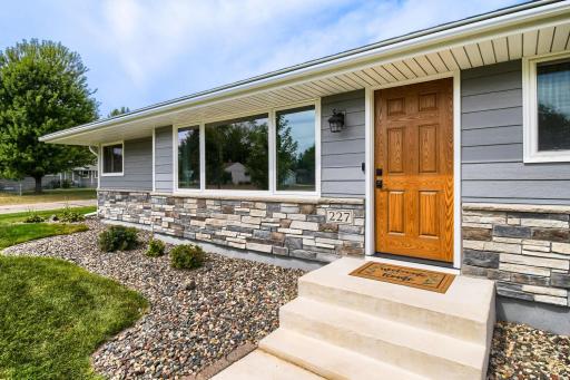 Stacked stone accents & premium LP board siding--note the new door & windows!