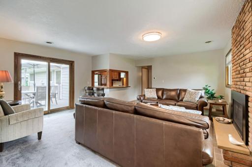 Main floor family room with large sliding door to the newer 22 X 12 composite deck