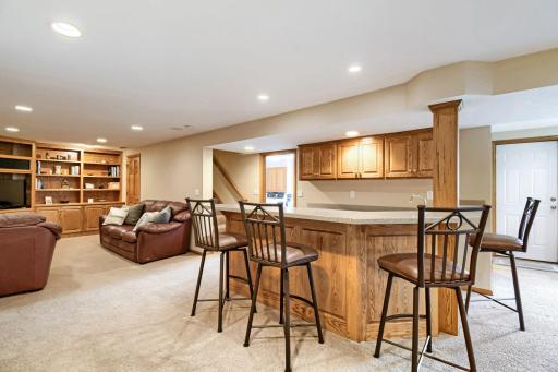 Lots of options for entertaining the the lower level--all the cabinets are custom raised panel oak