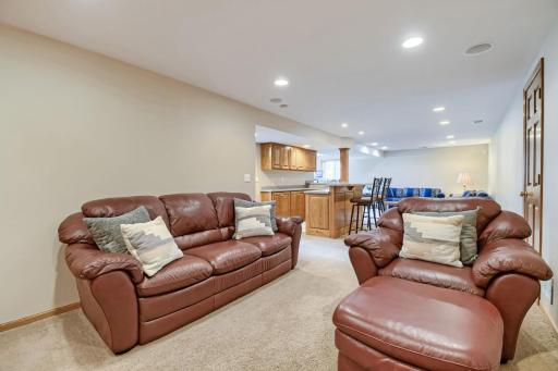 View of lower level with walkout to the left--note the abundance of recessed lighting