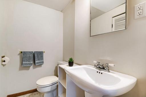 Three nicely finished bathrooms--two up and one down