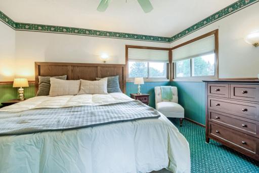14 X 13 primary bedroom with nice reading area by the windows