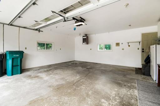 Very clean 2 car garage is fully sheet rocked & insulated--note the gas furnace