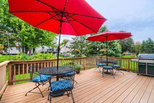 Spacious outdoor deck offers plenty of room for dining, entertaining, and relaxing. Surrounded by mature trees and greenery, itâs a wonderful space to enjoy the outdoors.