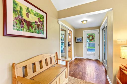 Bright Foyer Leads to the Four-Season Sunroom