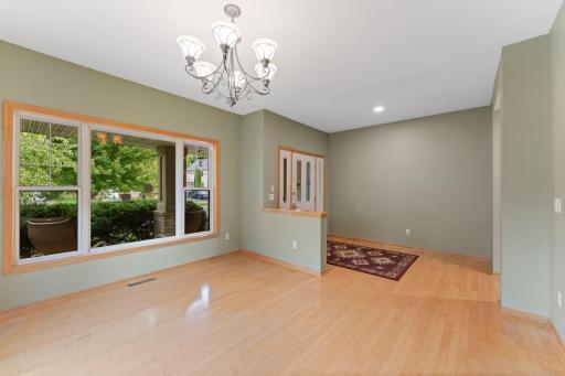 Well apointed living room with hardwood floors.