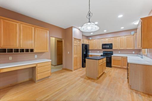 Open concept layout connects kitchen, dining room and family room.