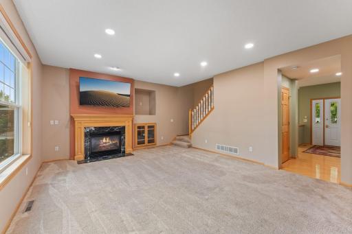 First floor family room. Built in sound system and gas fireplace.