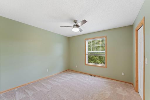 Third of four bedrooms on upper level.