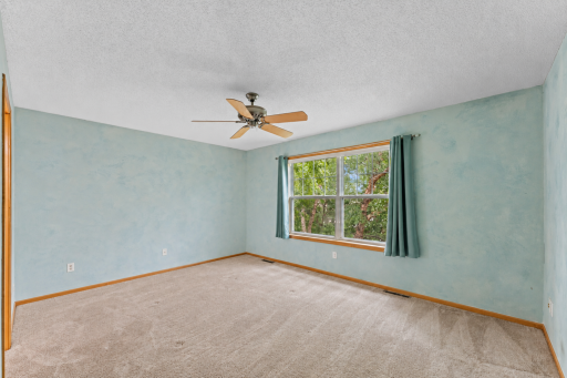 Primary bedroom includes ensuite bathroom and walk-in-closet.