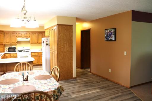 Hallway to garage, 2nd bath and laundry/utility area