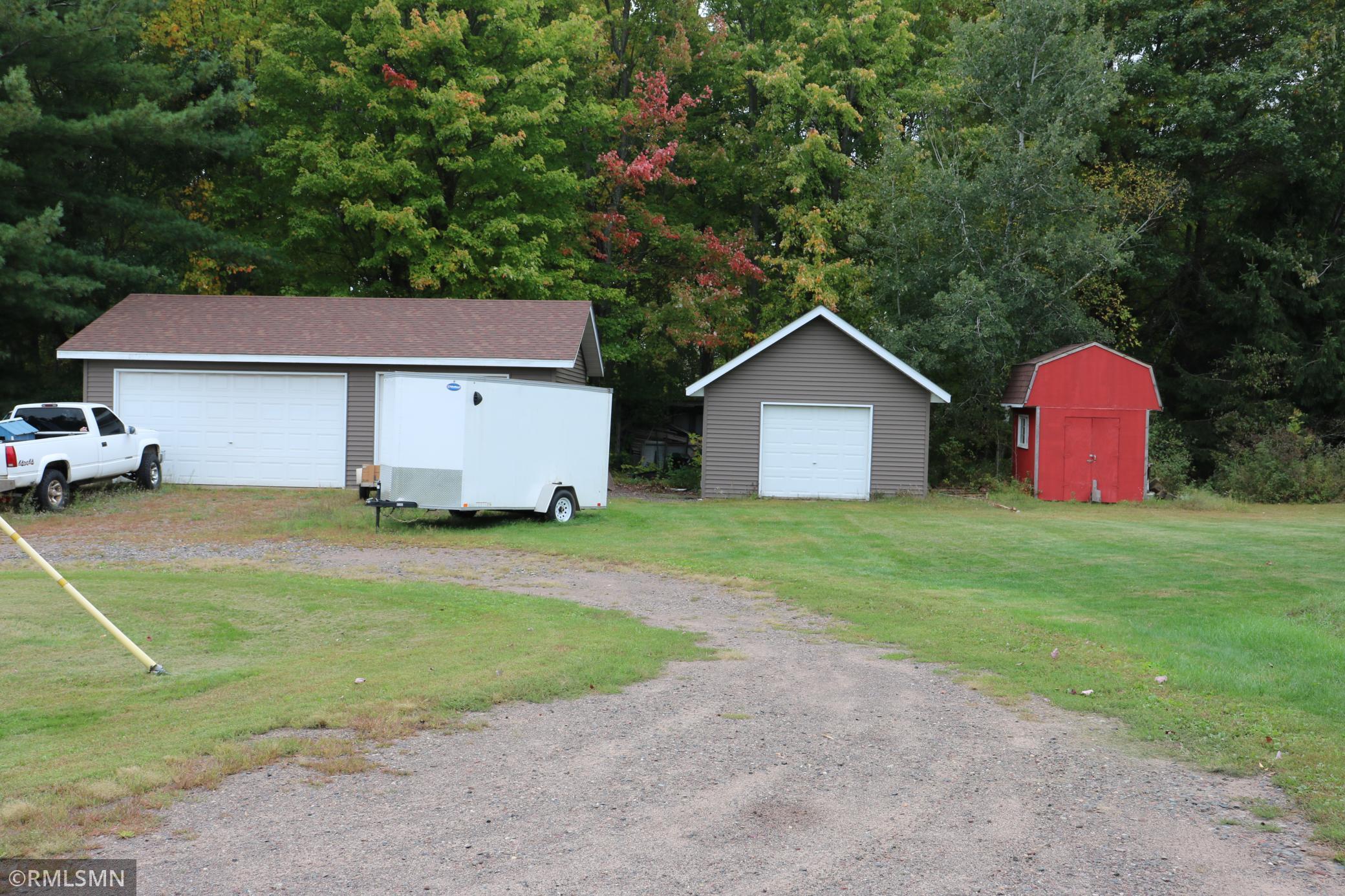 22 x 32 insulated shop, 16 x 16 garage, and 8 x 12 storage building.
