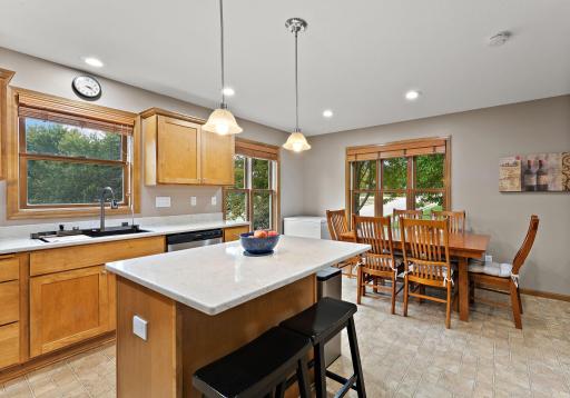 Center island offers extra seating and workspace~
