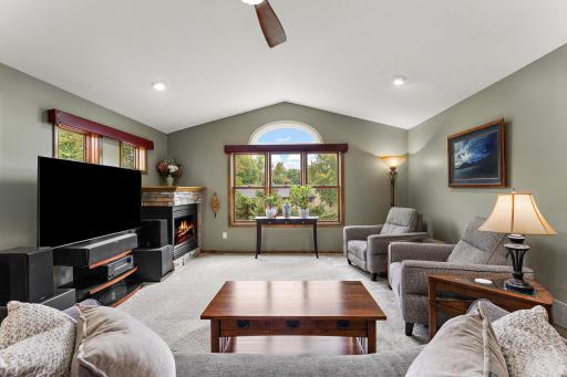 Vaulted living room with corner gas fireplace!