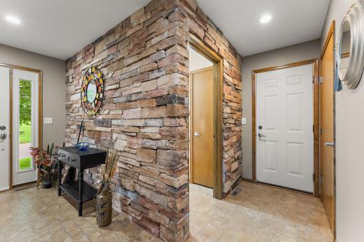 The garage entrance is right near the kitchen as well as main floor laundry