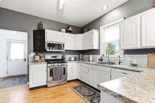 Back door enters in to the kitchen - perfect for unloading your groceries when you park in the detached garage behind the home