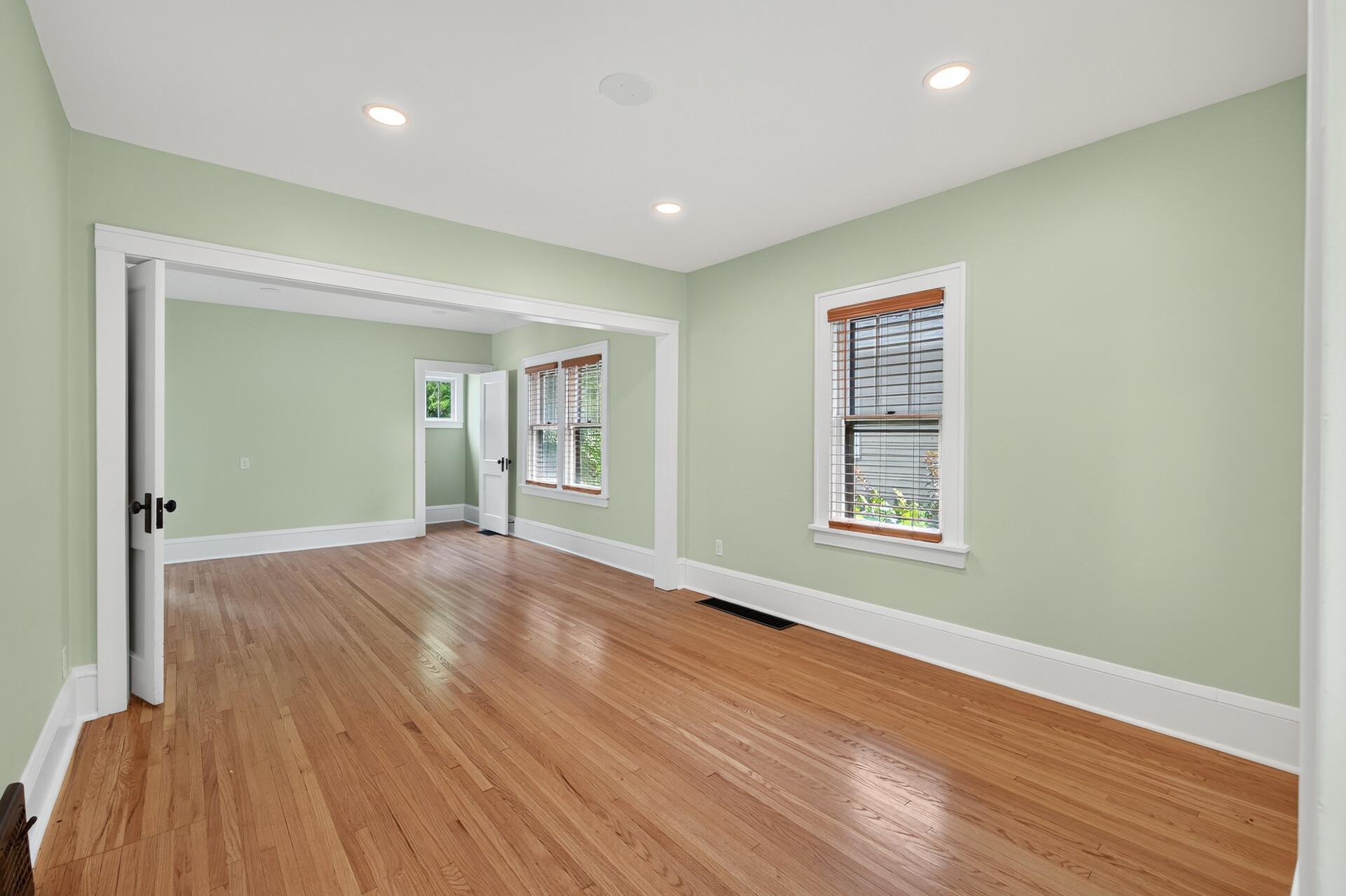 Living room with hardwood floors and natural light
