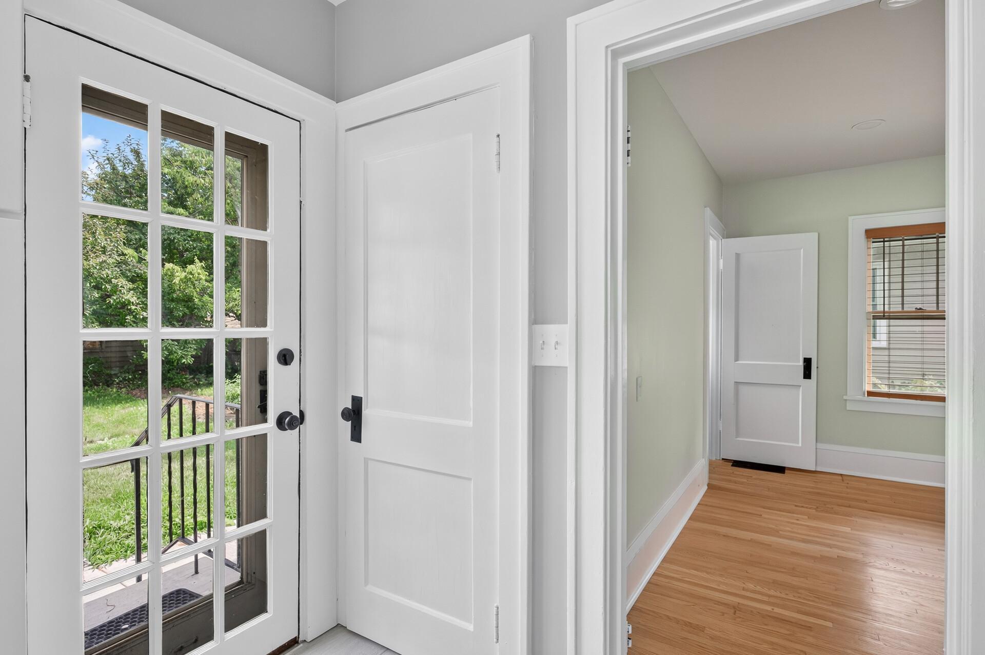 Back door provides convenient access to the yard and detached garage