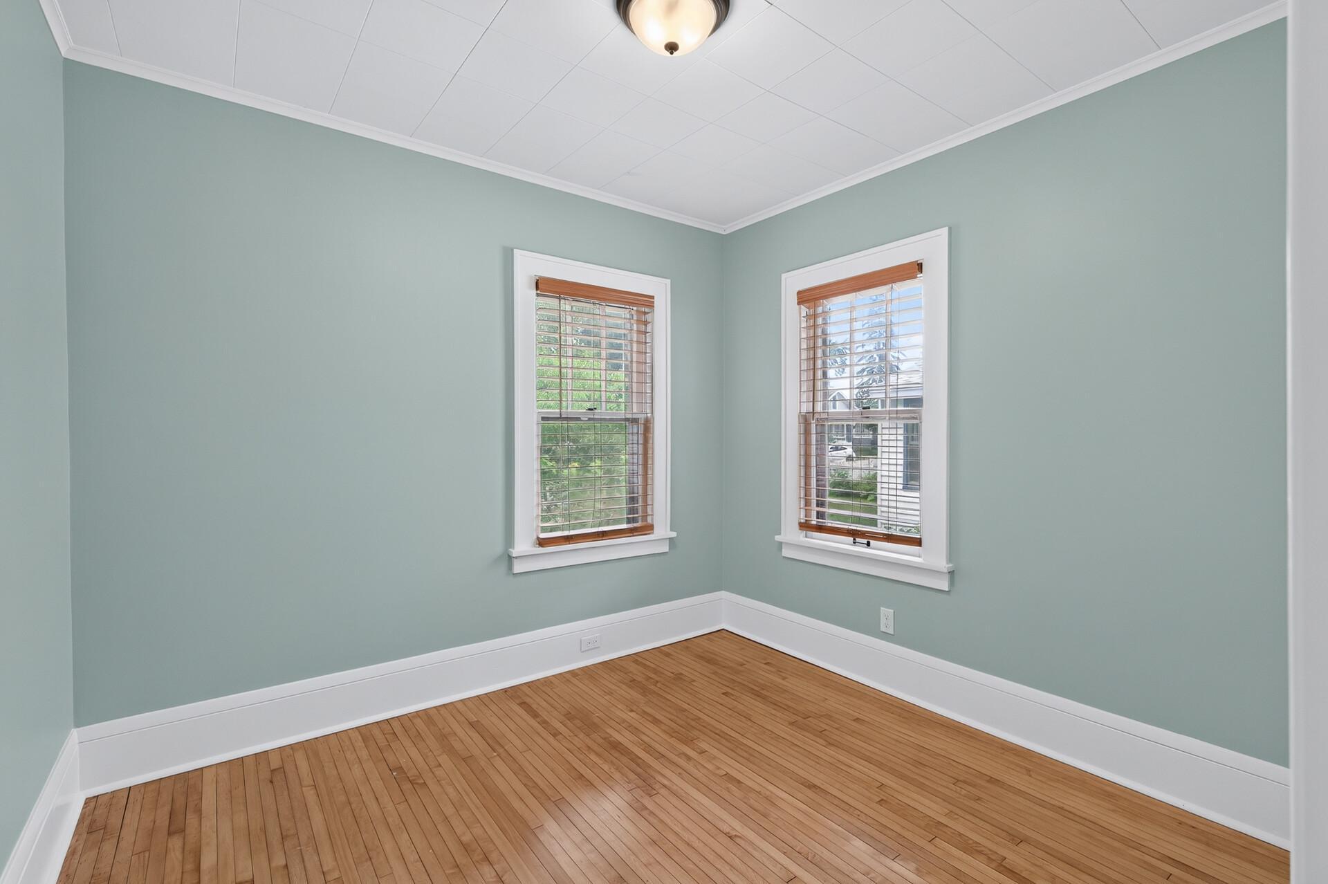 Main level bedroom with hardwood floors