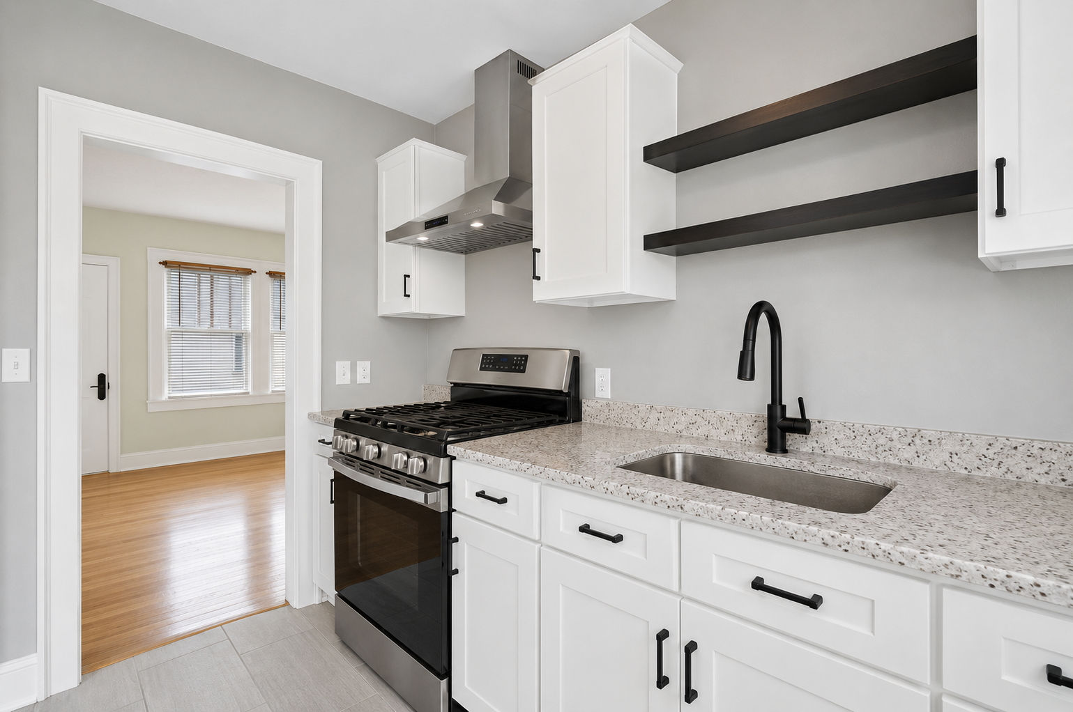 Updated kitchen with modern finishes and gas range