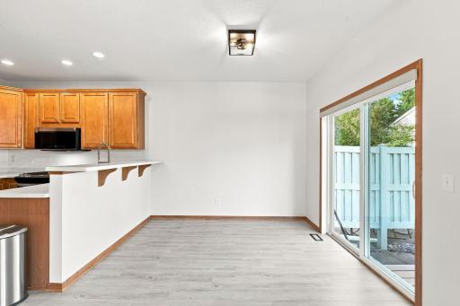Bright dining space with patio access and easy connection to the kitchen.