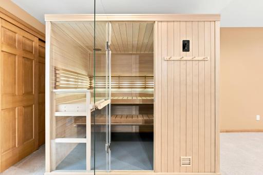 Private sauna creating a unique retreat within the home. Flex Room: Versatile bonus room ideal for office, fitness, hobby
