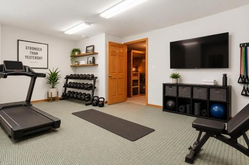 Versatile bonus room ideal for office, fitness, hobby, or storage space.