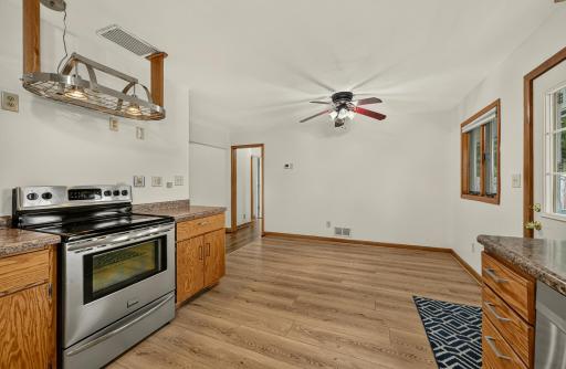 Kitchen and dining area with easy to maintain LVP flooring.