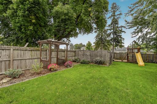 Private and beautifully landscaped back yard.