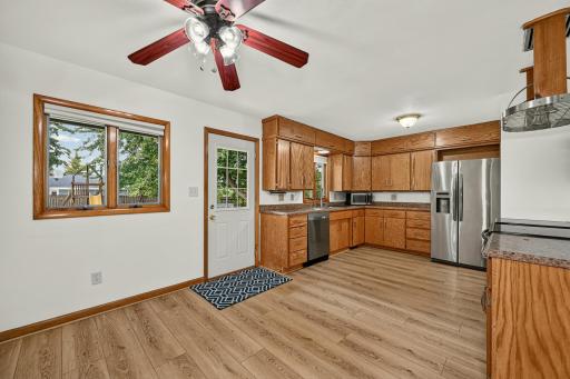 Dining room and open kitchen with lots of space and storage.