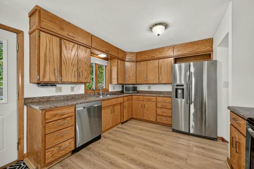 So much storage in this kitchen with stainless appliances.