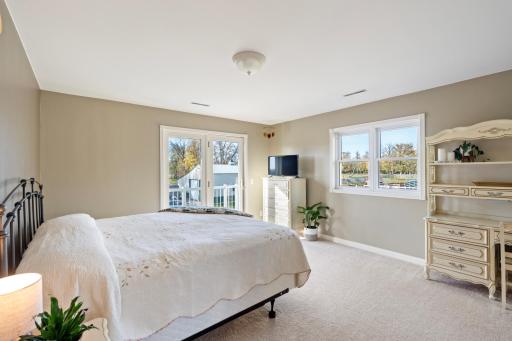 Upper level bedroom with balcony to South