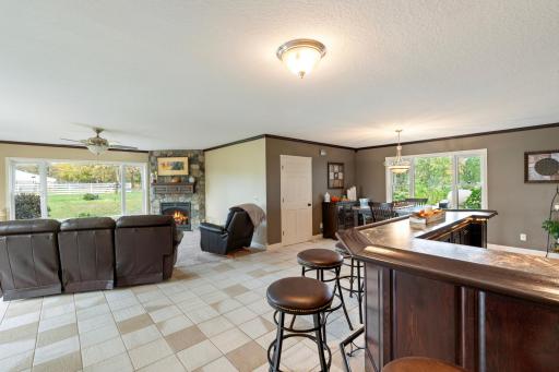 Family room with dining living and bar area for entertaining