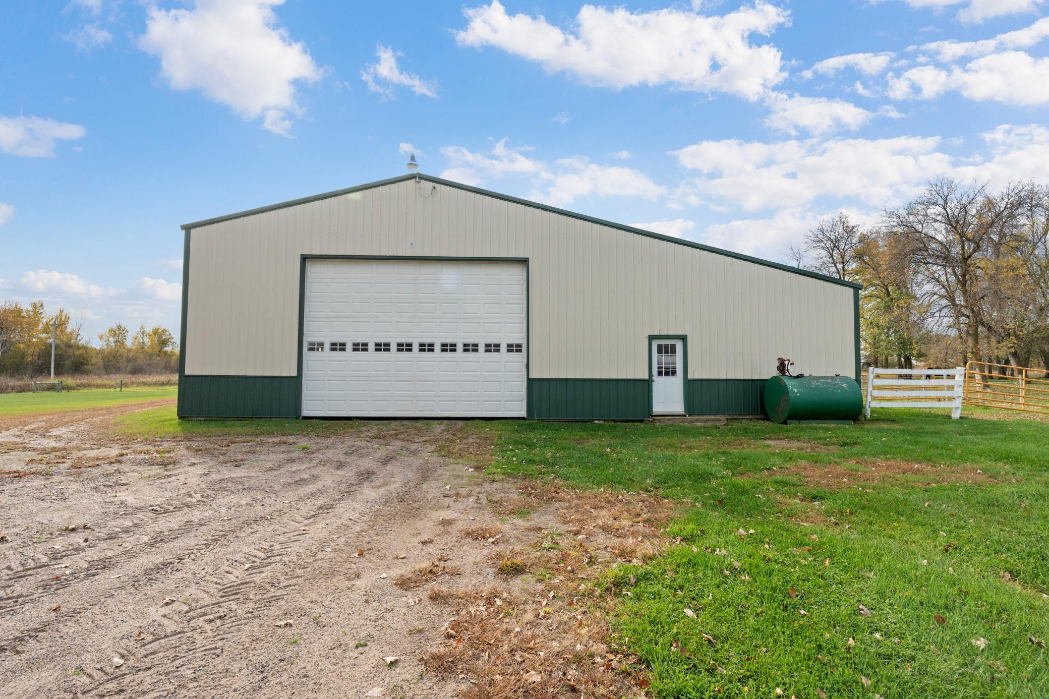 Oversized door to machine shed - gas barrel not staying