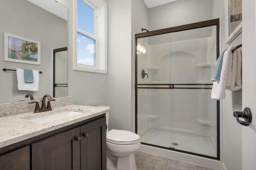 The main floor features a 3/4 bathroom, which is rare in two-story homes.