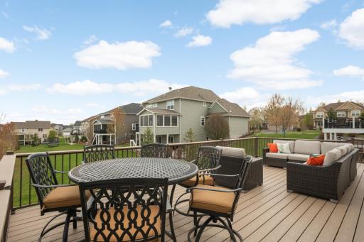 Maintenance-free deck with stairs to the backyard.