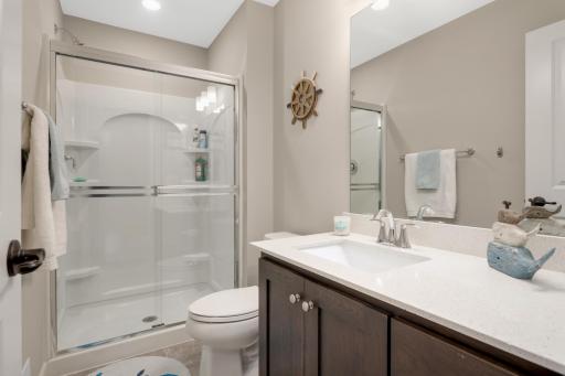 This 3/4 bathroom is adjacent to the bedroom.