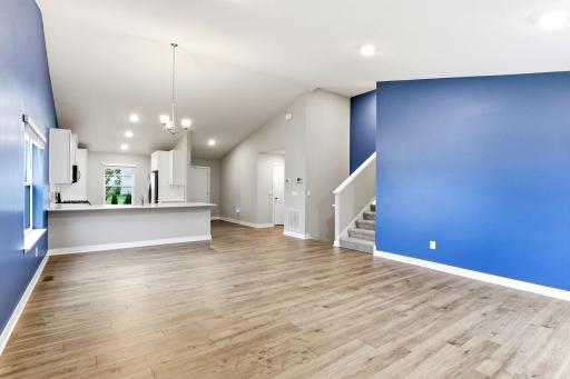 Main floor living room/dining room and foyer.