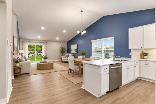 Virtually staged, main level with view to backyard.