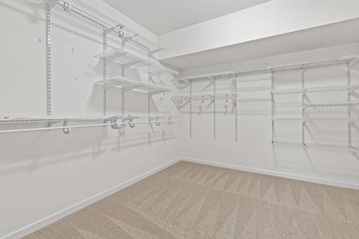 Ample Space in the Primary Walk-In Closet
