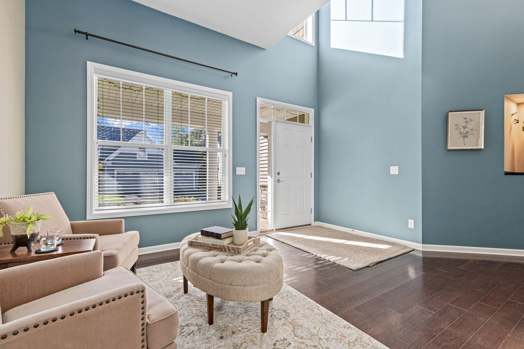 Sunlight and a two story foyer greet you!