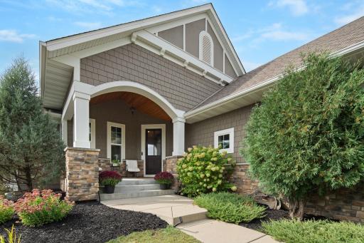 The extensive landscaping, combined with the shakes and the stone, help create outstanding curb appeal.