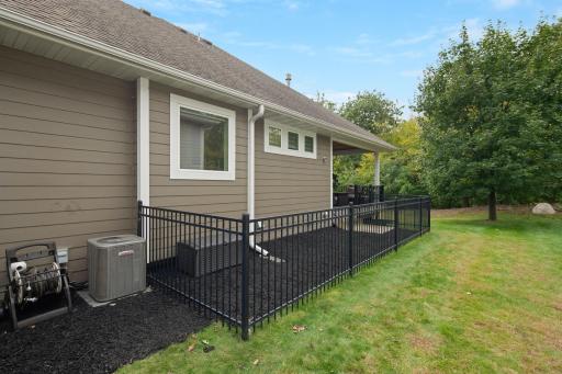 Fenced in area is perfect for dogs, or set up your game of bags.