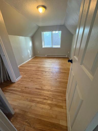 Large bedroom #1 with newly sanded and polished hardwood floors