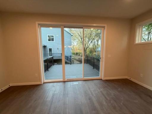 Sun-filled Gathering room with gorgeous floors.