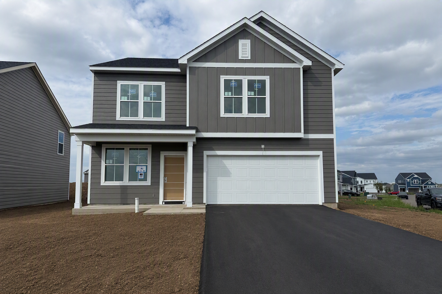 Exerior of Home. This photo has been edited to remove construction debris.