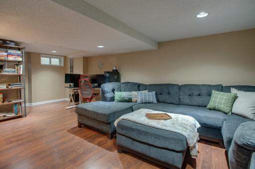 Basement family room is partitioned off for storage but can be a much bigger space for more acitvities!