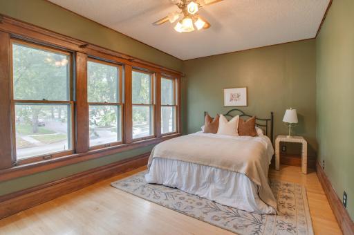 2nd bedroom which is spacious and filled with windows/light