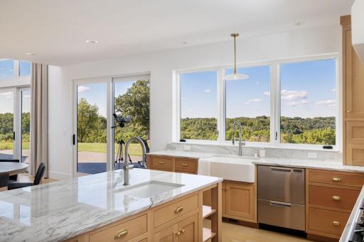 10 Even the Farmhouse Sink Was Designed Around the View.jpg