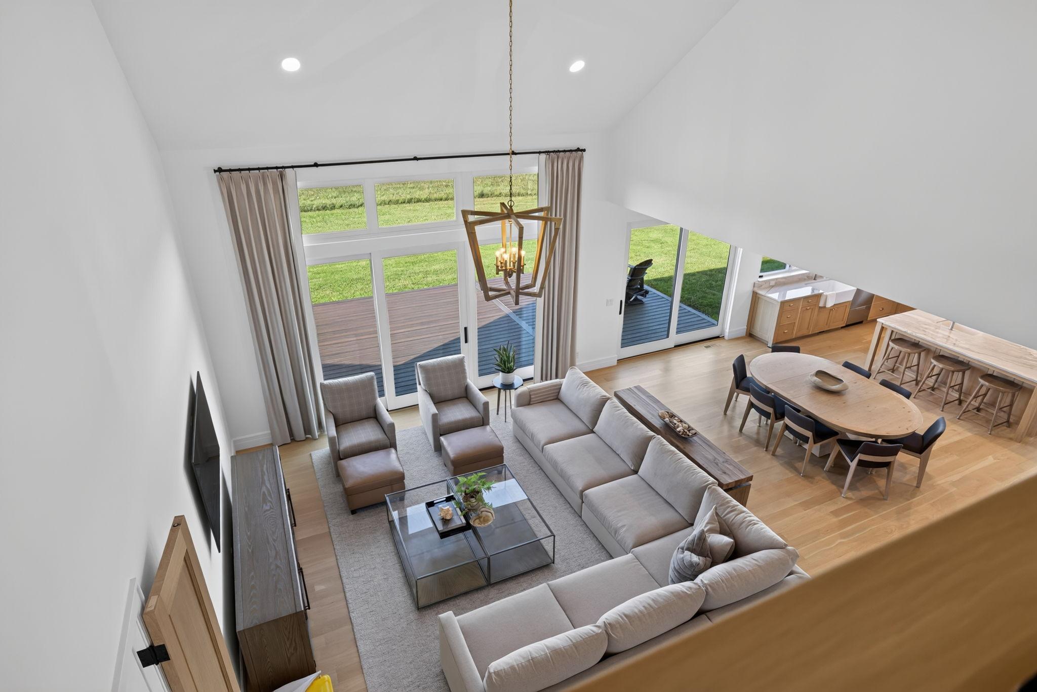 28 Loft View Into the Great Room with 26 Ft. Vaulted Ceiling.jpg